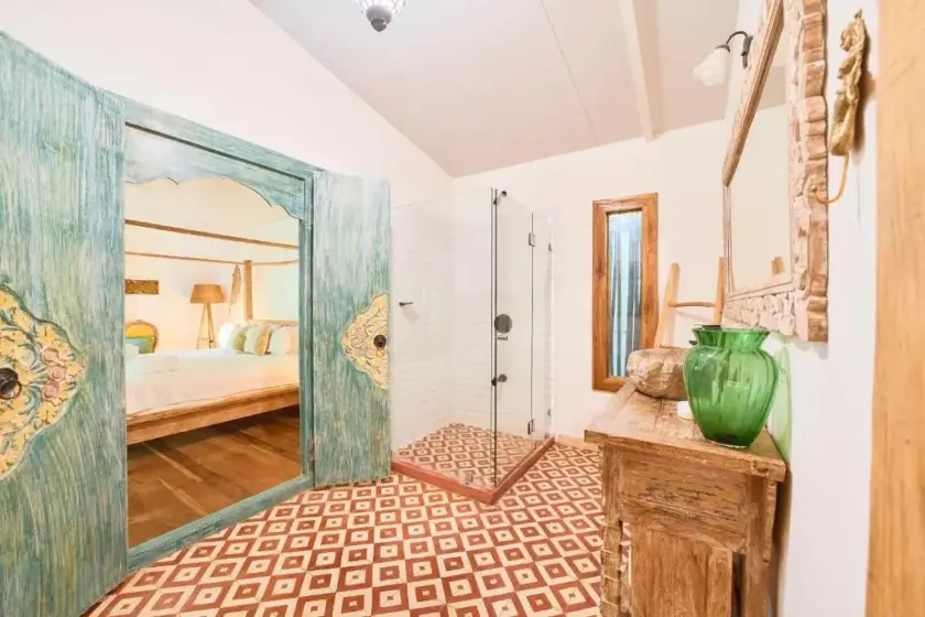 Bathroom and walk-in shower inside the private Bali-inspired retreat villa in Playa Chiquita, Costa Rica