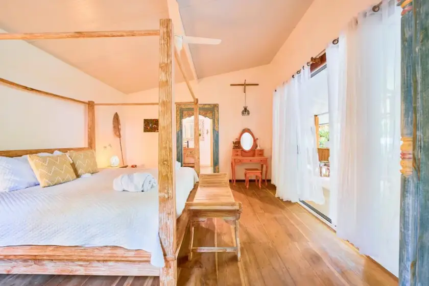 King bedroom inside a private Bali-inspired retreat villa in Playa Chiquita, Costa Rica