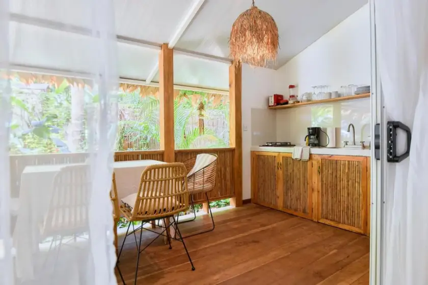 Kitchen and dining area inside the private Pranamor retreat villa in Costa Rica